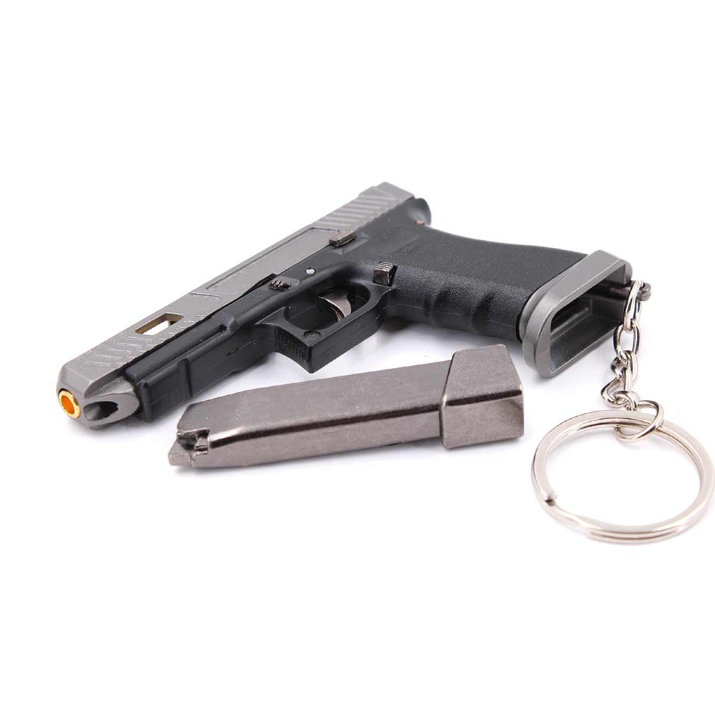 LLAVERO PISTOLA G34 7 CM GRIS