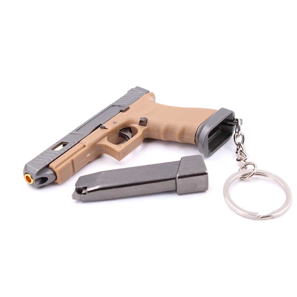 LLAVERO PISTOLA G34 7 CM TAN-GRIS