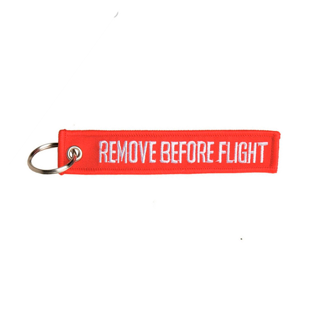 LLAVERO CINTA RECTANGULAR REMOVE BEFORE ROJO